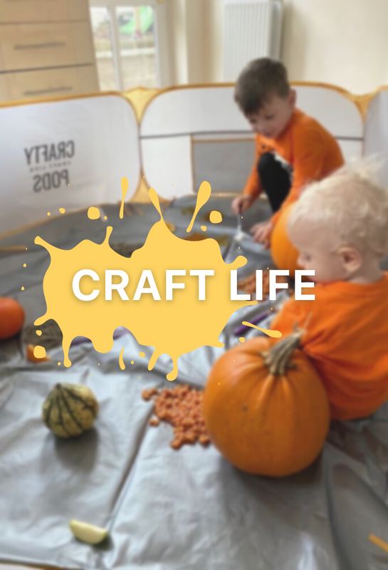 Craft Life Banner with two children playing with Pumpkins in a Crafty Pod with Messy Mat